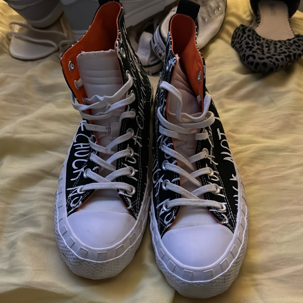 Black with White Writing Converse